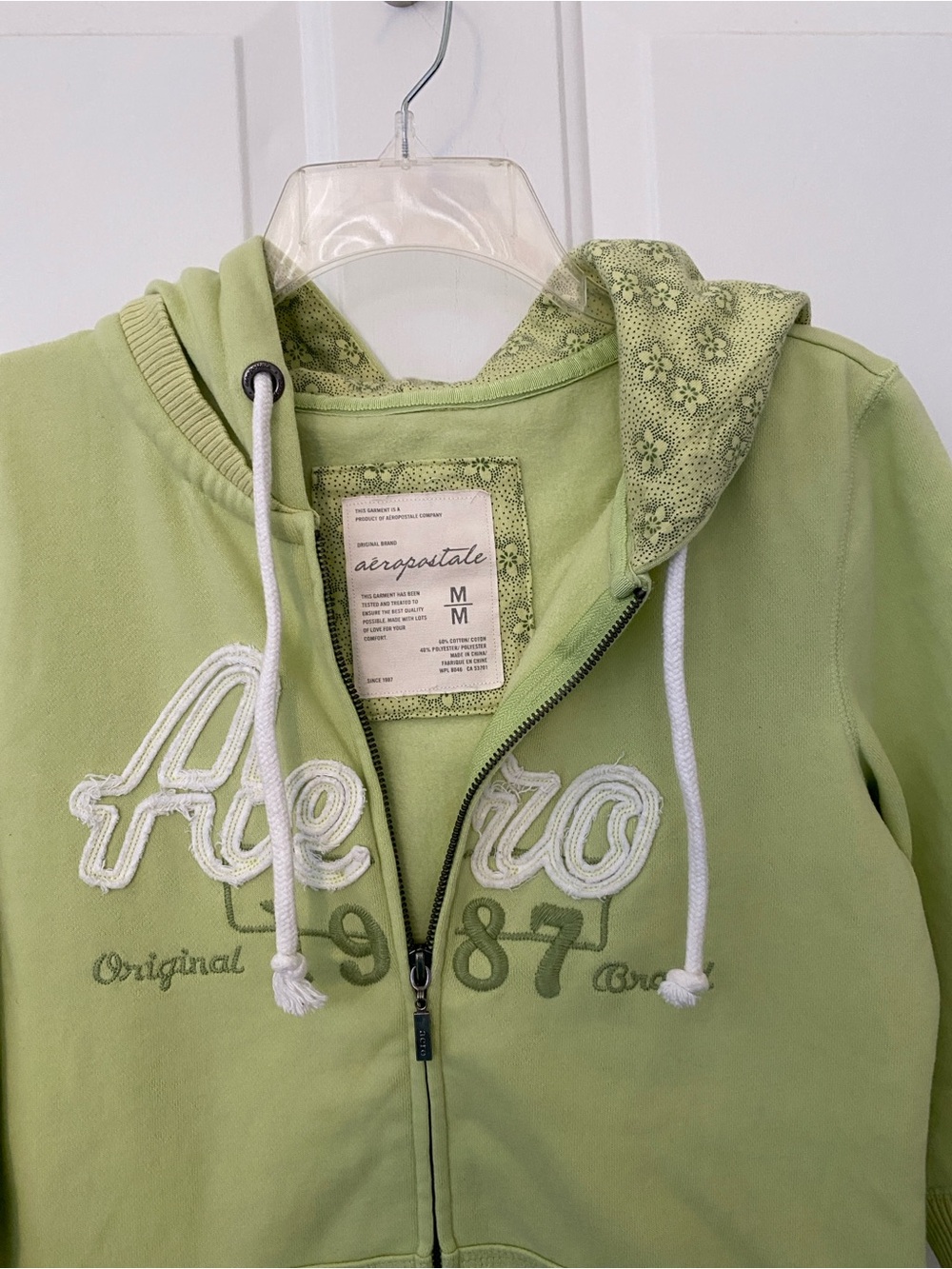 Aeropostale Light Green Zip-Up Hoodie with Floral Hood Lining for Teenagers